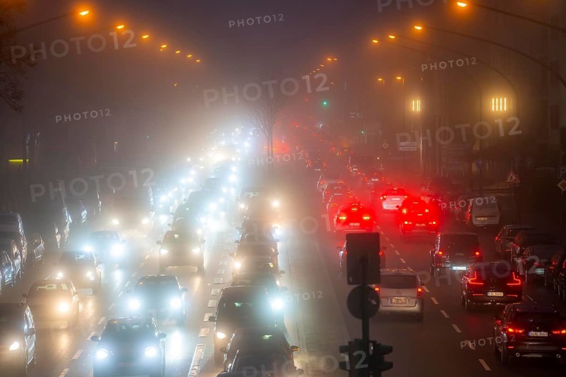 Dense fog, with visibility sometimes less than 100 metres, city centre traffic at rush hour on Alfredstraße, B224, in Essen, North Rhine-Westphalia, Germany