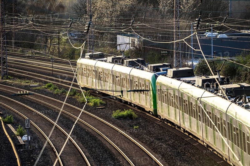 S-Bahn train on the tracks, railway layout, railway line west of the main station of Essen, North Rhine-Westphalia, Germany