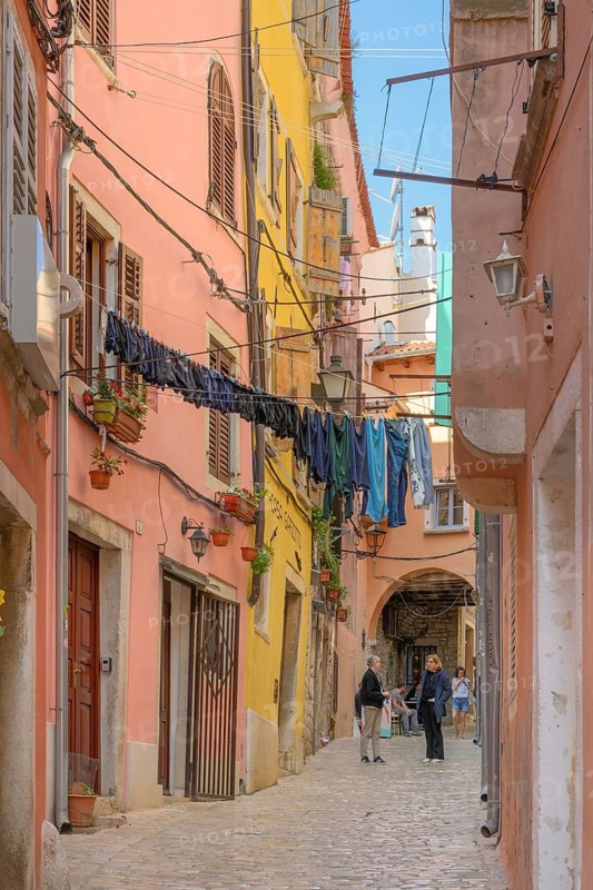 Laundry hangs on a clothesline to dry in the old town, Rovinj, Istria, Croatia