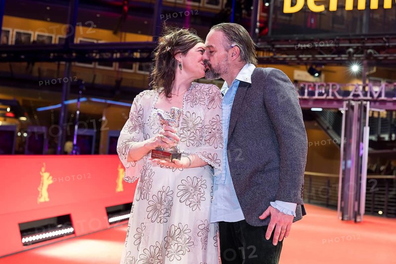Anna Fitch (US director) and Banker White (US director) pose with the Silver Bear for Outstanding Artistic Achievement for the film Yo (Love is a Rebellious Bird) after the award ceremony at the closing gala of the Berlinale at the Theater am Potsdamer Platz in Berlin on 21.02.2026. The 76th Berlin International Film Festival will take place from 12 to 22 February 2026