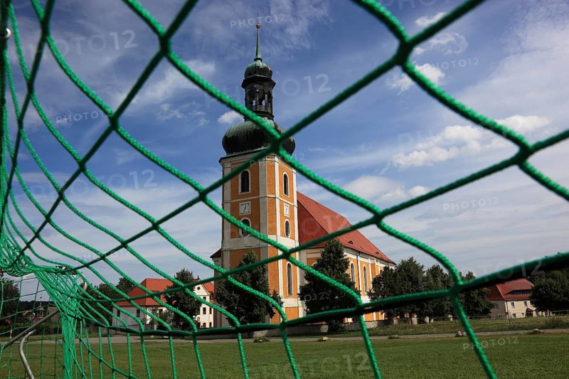 Rosenthal pilgrimage church in Ralbitz-Rosenthal, central pilgrimage site of the Catholic Sorbs, photographed through the goal network of the nearby soccer field, Bautzen district, East Saxony, things, Germany