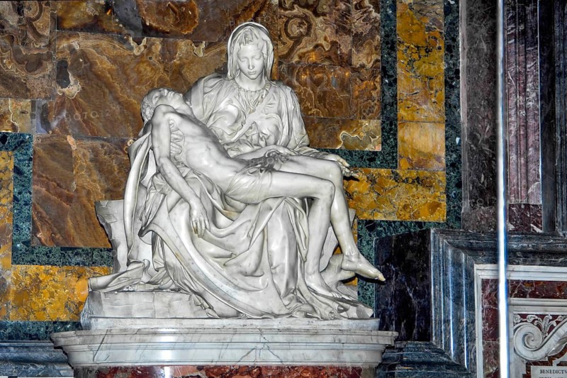 Close-up of marble sculpture La Pieta by Michelangelo Buonarotti High Renaissance sculptor with Mary Mother of God Mother of God Holy Virgin holding crucified Jesus Christ Saviour Son of God in her arms, Basilica maior San Pietro, Papal Basilica St. Peter's Basilica, Vatican City, Rome, Lazio, Italy