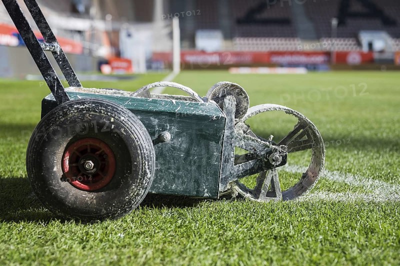 Line painting trolley on a soccer field