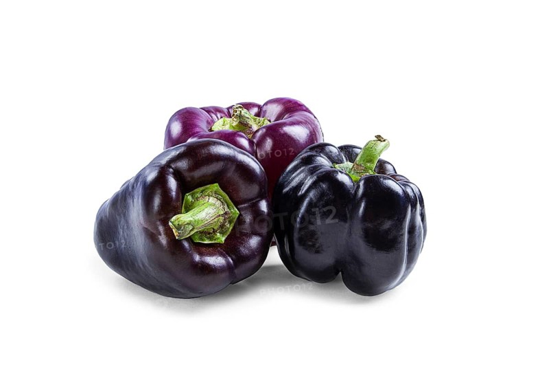 Assortment, purple and black pepper, on a white background, isolate