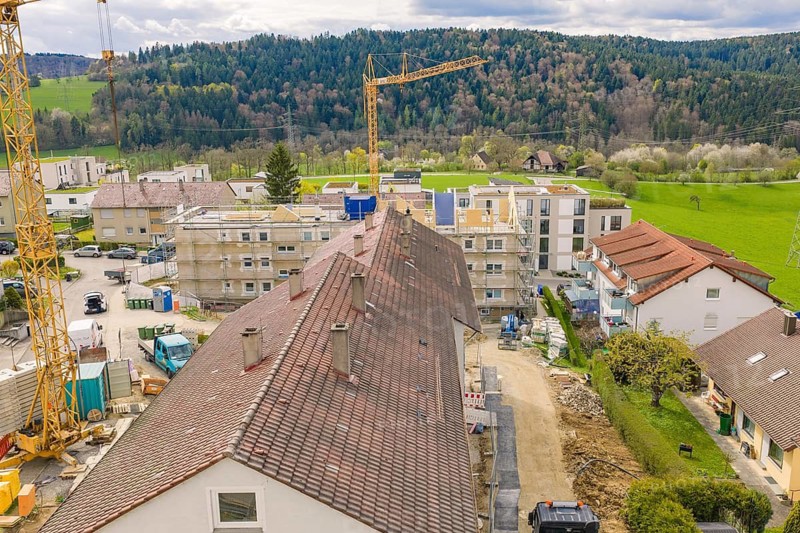 Aerial view of a roof with construction in front of a forest backdrop, residential building renovation, Nagold, Calw district, Germany