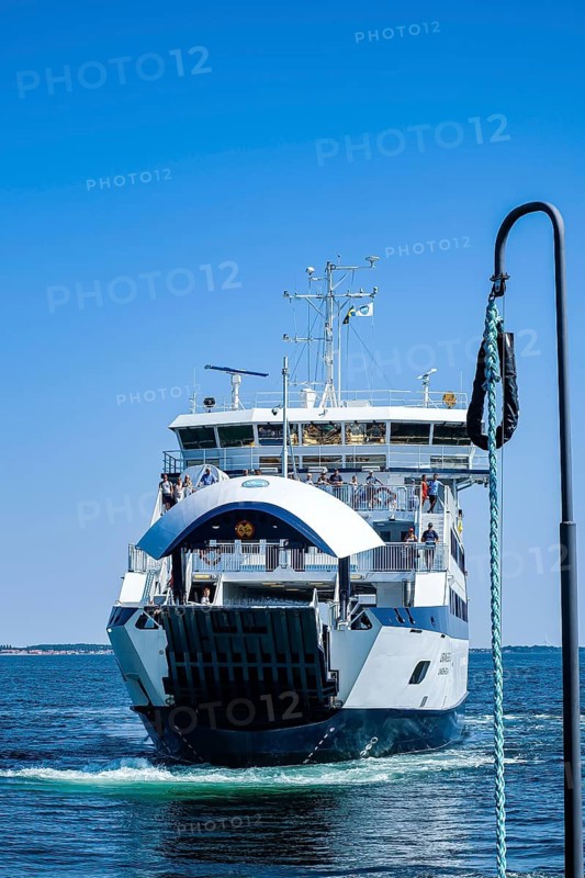 The URANIBORG ferry is approaching the dock in Bäckviken on the island of Ven, Landskrona, Skonen, Sweden, for editorial use only. The URANIBORG ferry is approaching the landing stage in Bäckviken on the island of Ven, Scania, Sweden — for editorial use only