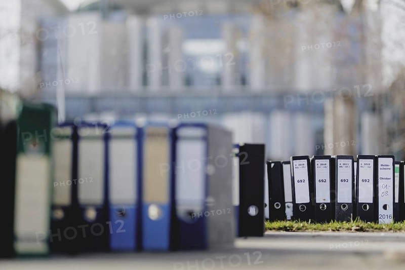 File folders stand in front of the Federal Chancellery as part of a protest action by the German Confederation of Skilled Crafts in Berlin, 26 February 2024. The German Confederation of Skilled Crafts demonstrates against the economic policy of the Federal Government as well as the high level of bureaucracy and the improvement of location conditions