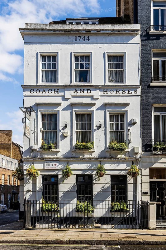 The Coach and Horses, a Grade II listed pub dating from the 1740s, stands on Hill Street, Mayfair, London, England, United Kingdom