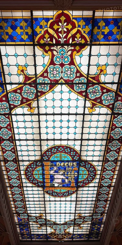Livraria Lello, interior of the Lello bookstore on the upper floor with the magnificent ceiling glass window by Samuel Van Krieken, Porto, Portugal