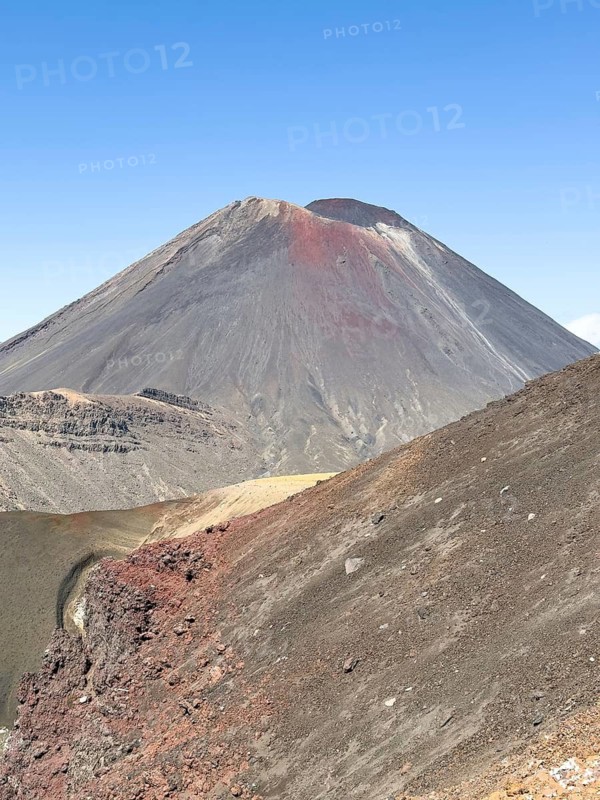 On the hiking trail of the Tongariro Alpine Crossing in Tongariro National Park with a view of the volcano Mount Ngauruhoe, North Island, New Zealand, Oceania