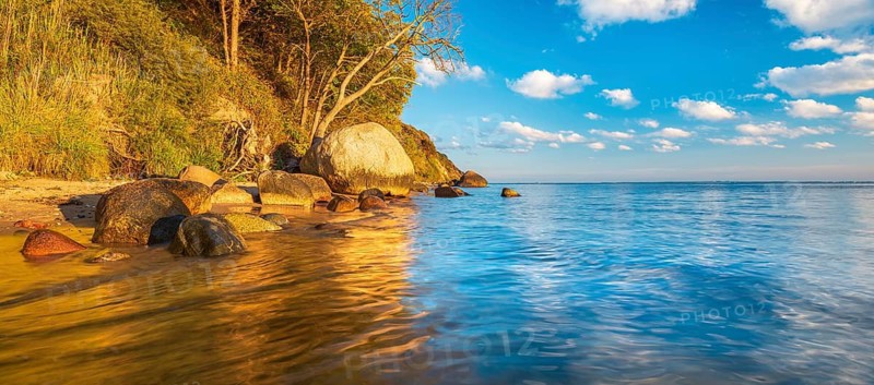 Coastal landscape with large boulders on the Baltic Sea beach in the evening light, Mönchgut Nature Reserve, Groß Zicker, Mönchgut Peninsula, Rügen Island, Mecklenburg-Western Pomerania, Germany