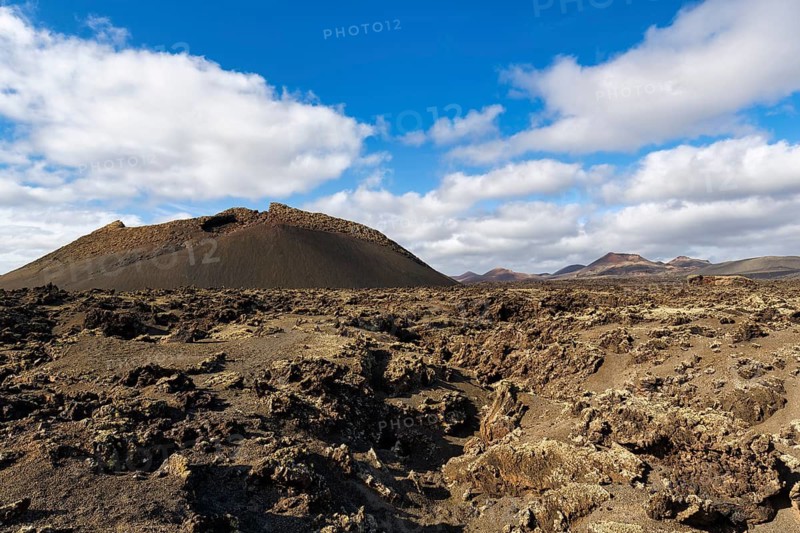 Volcanic crater Caldera de Los Cuervos, lava fields, Los Volcanes nature park Park, Tias, Yaiza, Lanzarote, Spain