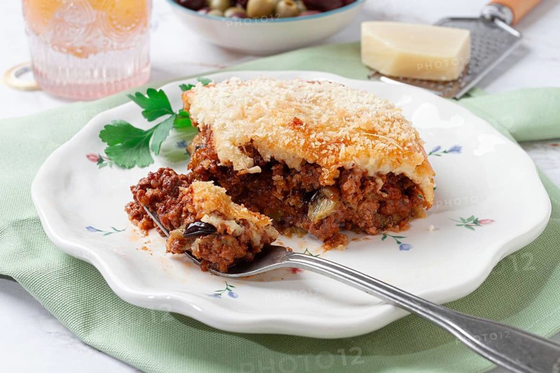 Greek dish moussaka, baked eggplant with minced meat, with bechamel sauce, home cooking