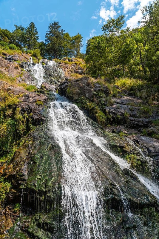 Lots of water in summer at the Todtnau waterfall in the Black Forest in Germany