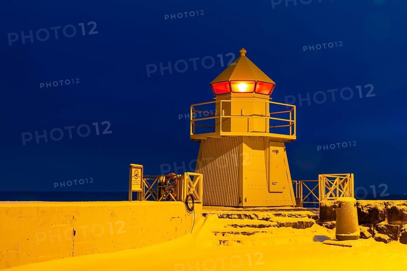 Lighthouse in Reykavik harbour, winter, blue hour, Iceland, Scandinavia