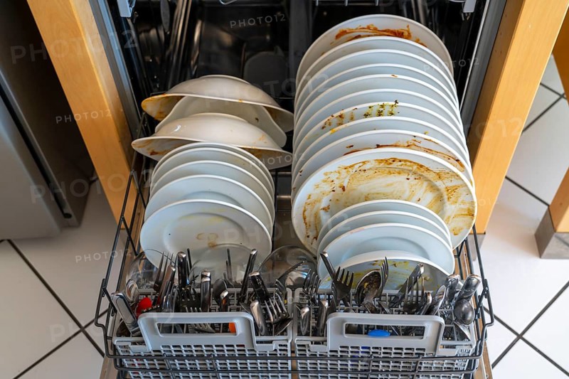 Dishwasher, full of dirty crockery