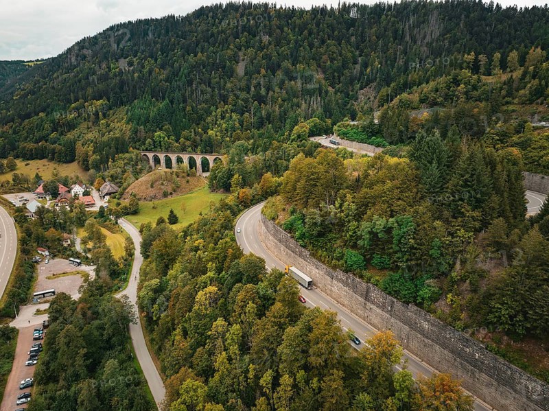 Road and viaduct in the middle of forest and village, Ravenna Gorge, Black Forest, Germany