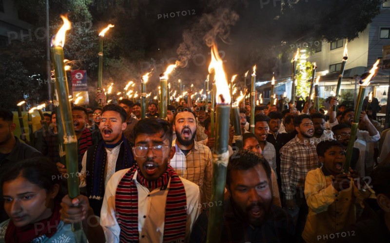 Members of the All Assam Students' Union (AASU) take part in a flaming torch rally and shout slogans to protest against the implementation of the Citizenship Amendment Act (CAA), on March 12, 2024 in Guwahati, Assam, India. The Citizenship Amendment Act (CAA), passed by the Indian Parliament in 2019, indeed grants expedited citizenship to specific religious minorities from Afghanistan, Bangladesh, and Pakistan who arrived in India on or before December 31, 2014. These religious minorities include Hindus, Sikhs, Buddhists, Jains, Parsis, and Christians