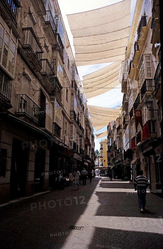 Large tarpaulins to provide shade for a street in the city centre of Cádiz, Spain