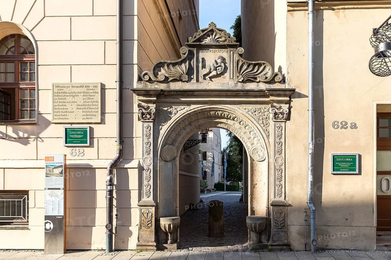 Old archway as an entrance to the historic university of Luther city Wittenberg, Saxony-Anhalt, Germany
