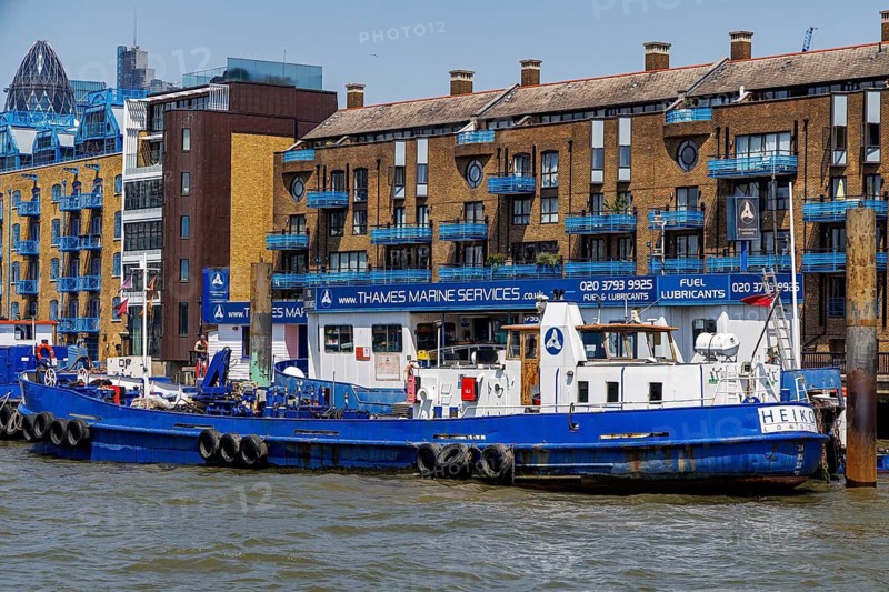 A Thames Marine Services fuel and lubricant tanker moored at its riverside base at Wapping, London, England, United Kingdom