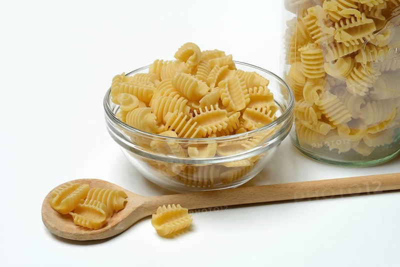 Italian pasta in a glass bowl, Radiatori variety
