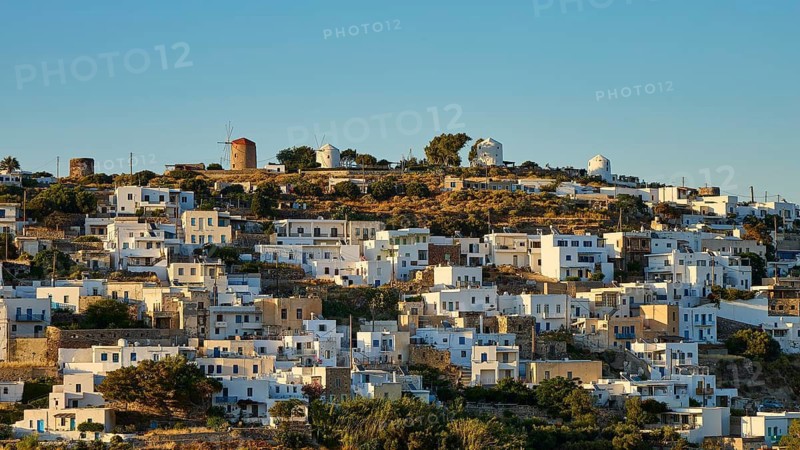 Whitewashed houses and windmills on a hill under clear sky, Trypiti, Tripiti, village, Milos, island, Cyclades, Greek Islands, Greece