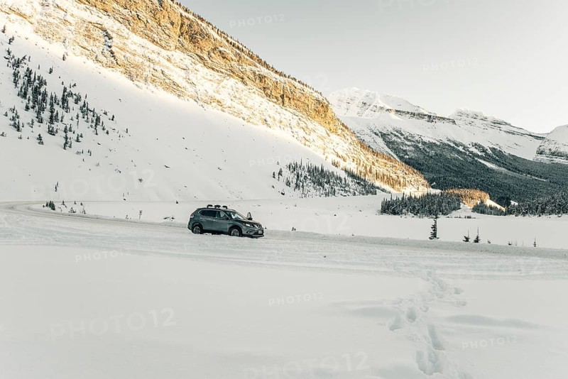 Winter road trip on the Icefields Parkway with lots of snow and ice, Banff National Park, Jasper National Park, Alberta, Canada