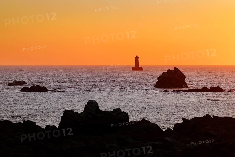 Sunset at the Phare du Fourb on the Atlantic coast near Porspoder, Bretgane, France
