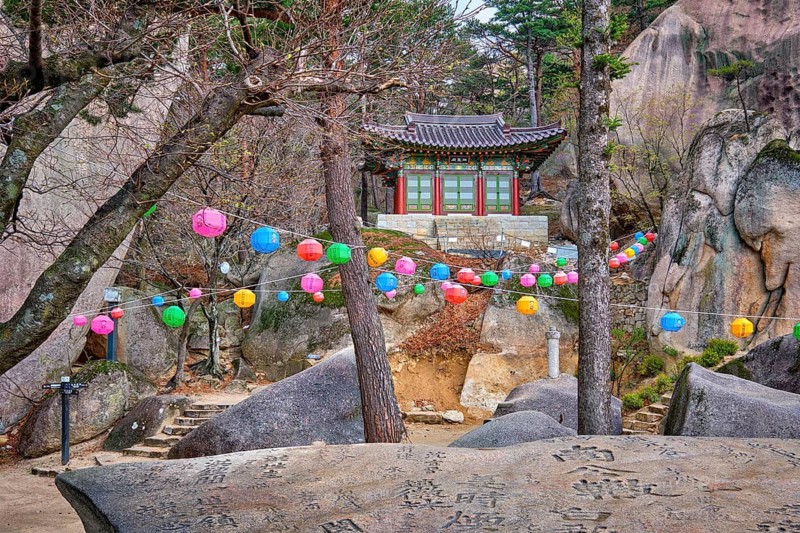 SEORAKSAN, SOUTH KOREA, APRIL 14, 2017: Kyejoam Seokgul Hermitage shrine and Ulsanbawi rock in Seoroksan National park, South Korea