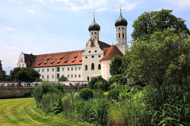 Benediktbeuern Abbey, former Benedictine Abbey, today a branch of the Salesians of Don Bosco, monastery basilica of St. Benedict with attached Anastasia chapel. In the foreground the herb garden, Bad Tölz-Wolfratshausen district, Upper Bavaria, Bavaria, Germany