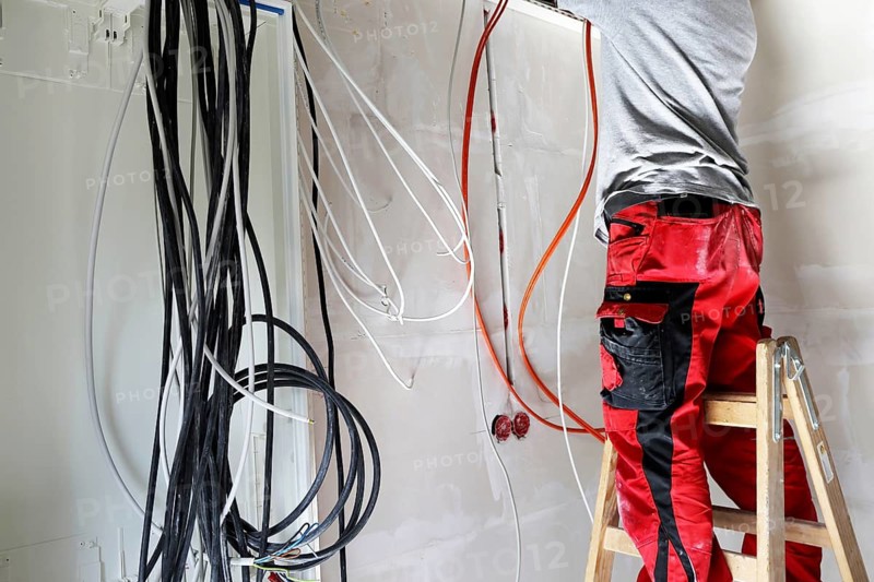 Professional electrical installation on a building shell