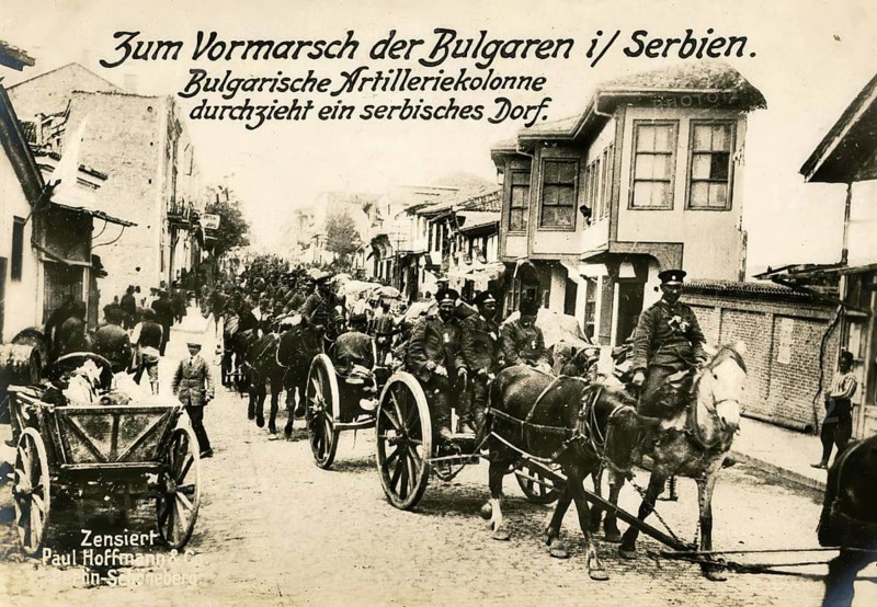 On the advance of the Bulgarians in Serbia. Bulgarian artillery column passing through a Serbian village, 1914 - 1918, World War I, reproduction of a war postcard