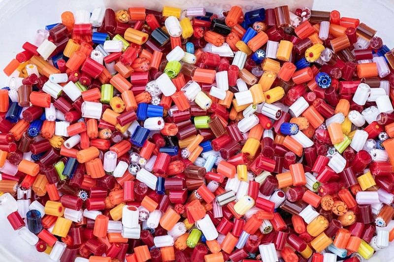 A colorful array of Burano and Murano glass beads from Venice, showcasing intricate craftsmanship and vivid hues. Perfect for jewelry, decor, and artistic inspiration