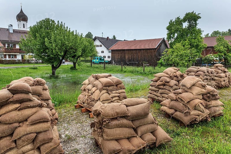 Sandbags, continuous rain, high water, flooding, town, houses, Whitsun floods 2013, climate change, Schlehdorf, Alpine foothills, Bavaria, Germany