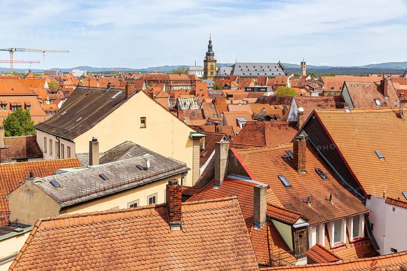 View from the rose garden of the New Residence over the roofs of the old town with St Martin's Church, Bamberg, Bavaria, Germany