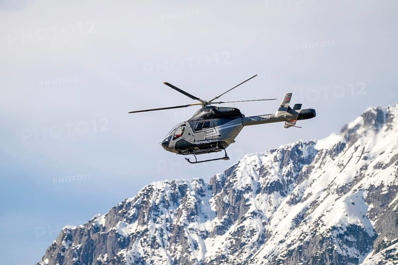 Rescue helicopter, emergency medical helicopter in flight, Schwaz, Tyrol, Austria