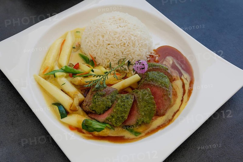 Froben Restaurant am Schloss, restaurant, gastronomy, eating and drinking, food, lamb, fillet in herb coating, rice, asparagus, vegetables, plated, Meßkirch, Baden-Württemberg, Germany