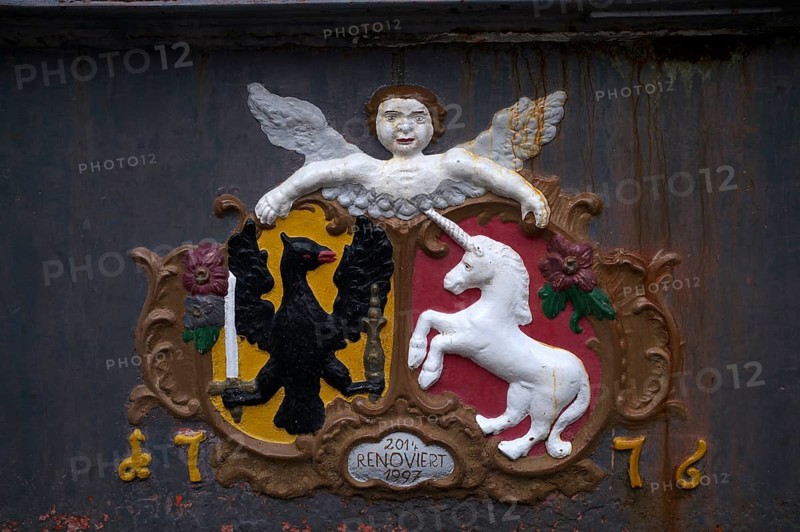 Black eagle and unicorn in the coat of arms of the imperial city on Marktbrunnen, Schwäbisch Gmünd, Baden-Württemberg, Germany