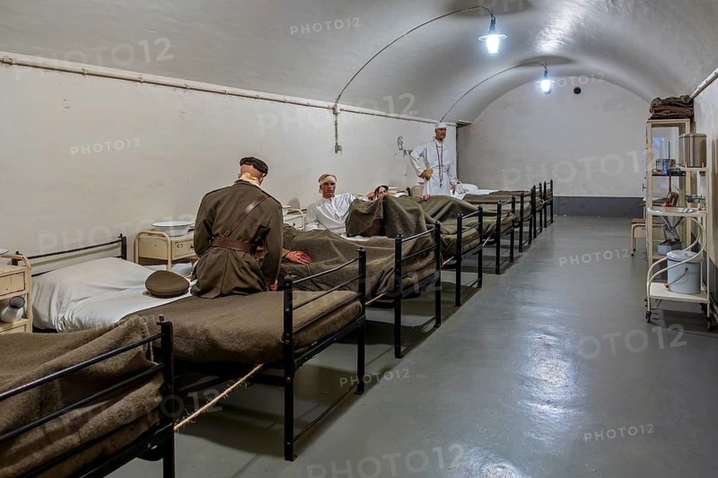 Diorama of infirmary, sick-bay with wounded soldiers at Fort Eben-Emael, Belgian WW2 fortress during the Second World War Two in Belgium