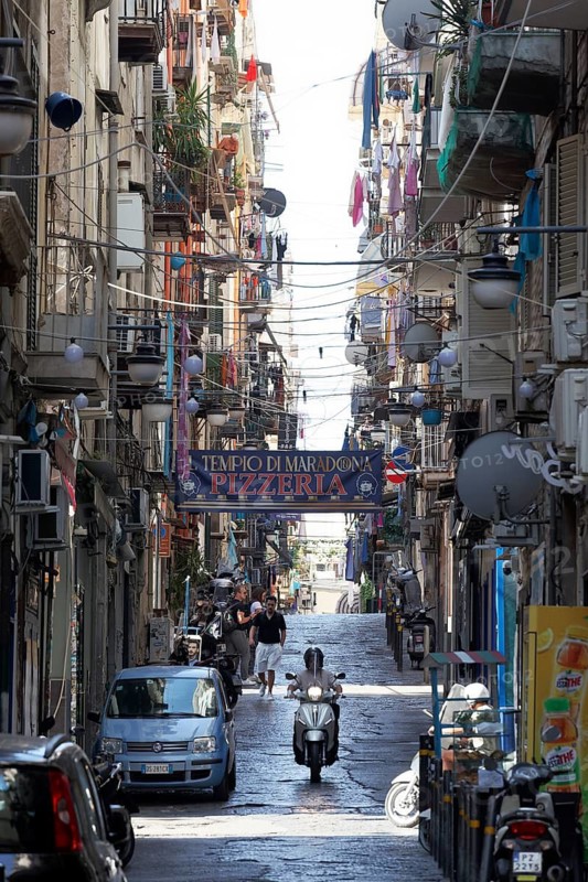 Narrow alleyway with residential buildings in Quartieri Spagnoli, Spanish Quarter, Naples, Campania, Italy