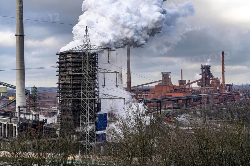The Thyssenkrupp Steel steelworks in Duisburg-Marxloh, on the Rhine, quenching tower of the coking plant, blast furnaces 1 and 2, right, North Rhine-Westphalia, Germany