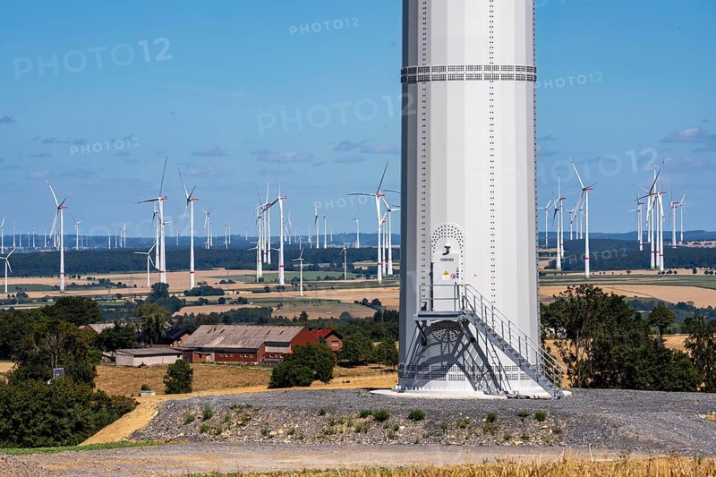 Wind power plants east of Lichtenau, in front of that a new wind turbine near Bad Wünnenberg Haaren, North Rhine-Westphalia, Germany