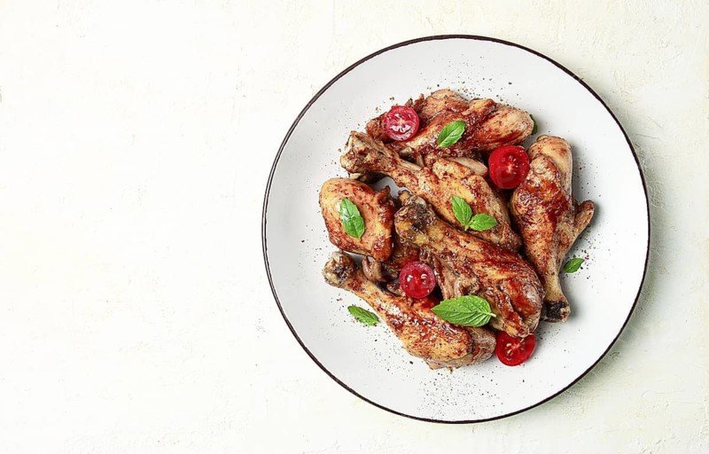 Fried chicken legs, in soy sauce, spices, herbs, top view, homemade