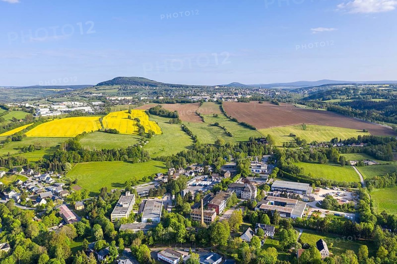 Aerial view with Pöhlberg and mountain town Annaberg-Buchholz, in the background the Bärenstein, Keilberg and Fichtelberg, in the foreground the industrial area of Wiesa, Thermalbad Wiesenbad, Erzgebirge, Saxony, Germany