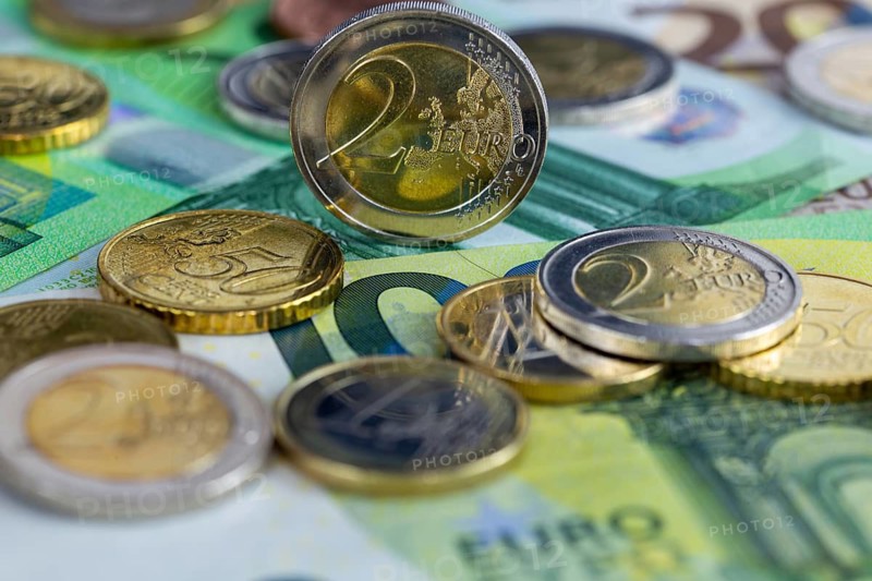 Close-up of euro banknotes and euro coins