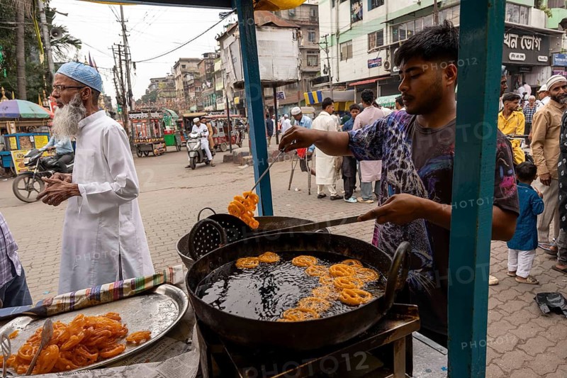 A vendor selling sweets during Eid al-Fitr near an Eidgah, on March 21, 2026 in Guwahati, India. Muslims make up a sizeable minority of India's population and celebrate Eid along with muslims across the world at the end of Ramadan
