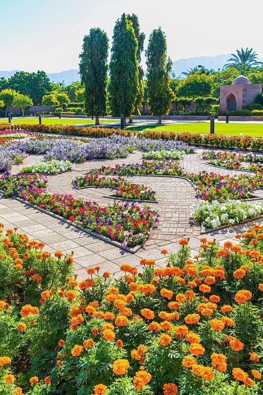 Park decorated with flowers in front of the Sultan Qaboos Mosque, Muscat, Arabian Peninsula, Sultanate of Oman
