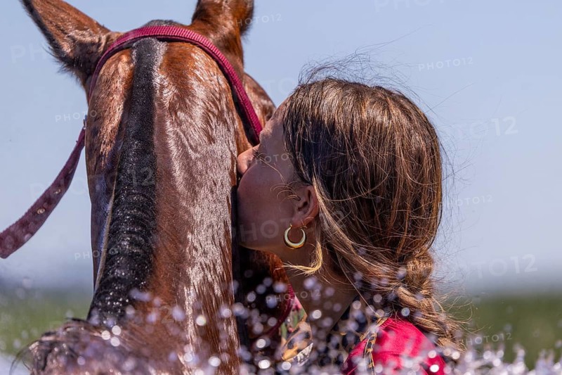 Polo player kisses a horse, polo horse, polo pony (Equus), polo tournament, 1295 Polo Masters, Sylvenstal, Pfullendorf, Linzgau, Sigmaringen district, Baden-Württemberg, Germany