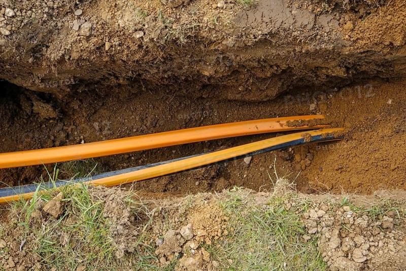 Rheinbach, North Rhine-Westphalia, Germany - Internet broadband expansion, construction site for laying fibre optic cable, new construction of fibre optic routes on behalf of Telekom, fast Internet, DSL cable connection for households